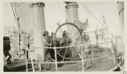 Image of Koo-e-tig-e-to [Kuutsiikitsoq] at wheel of the S.S. Roosevelt